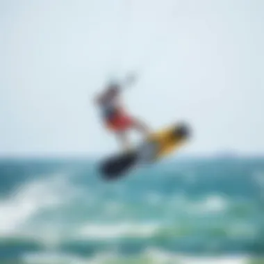 Dynamic action shot of a kiteboarder executing a jump