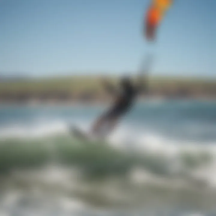 A vibrant kite soaring over the waves at Bodega Beach