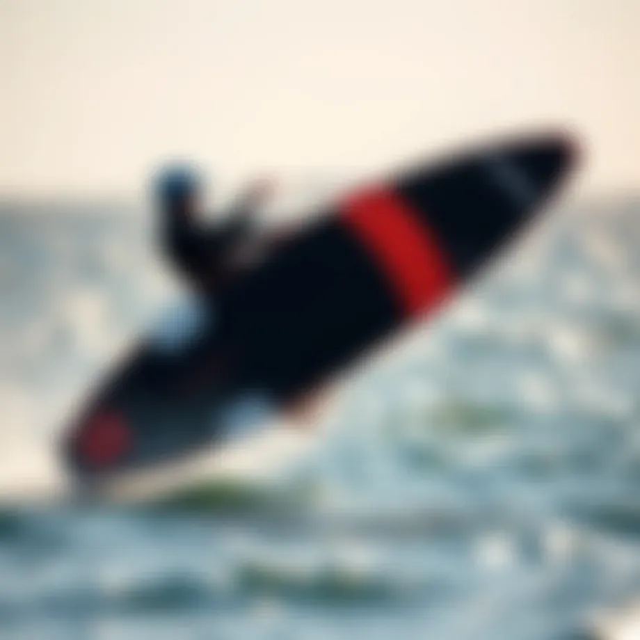 Dynamic shot of the Cabrinha Fusion Foil gliding over water
