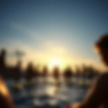 A serene sunset backdrop framing the vibrant community experience of foil surfboarding