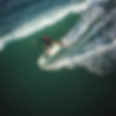 An aerial view of a rider mastering the art of balance on a water foil surfboard