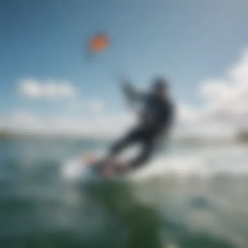 Kiteboarder gliding over crystal clear waters