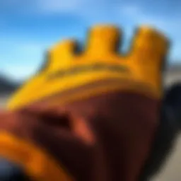 Close-up view of Dakine sailing gloves showcasing material texture