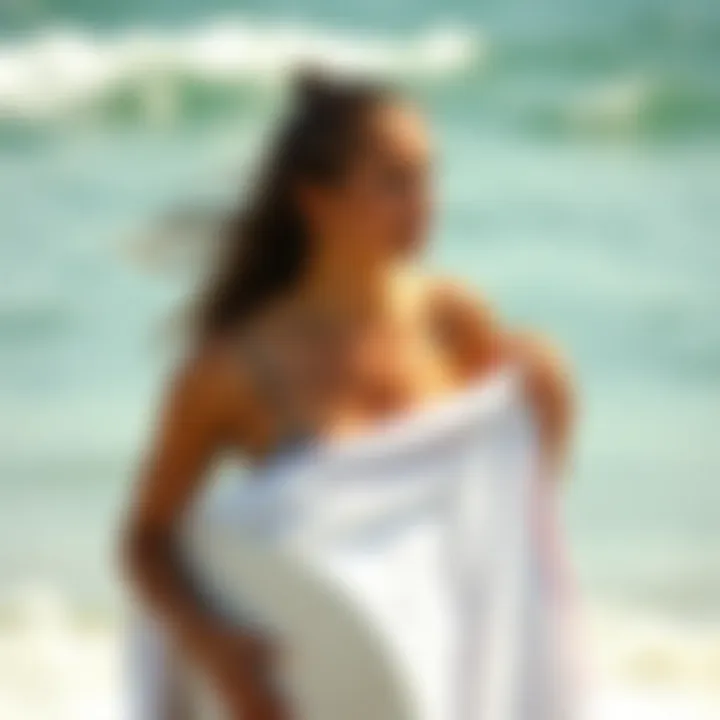 Stylish surfer using a changing towel post-surfing