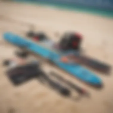 Kiteboarding gear laid out on the sandy shore of Aruba