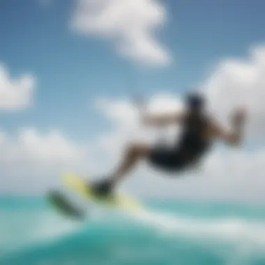 A kiteboarder gliding across the turquoise waters of Aruba