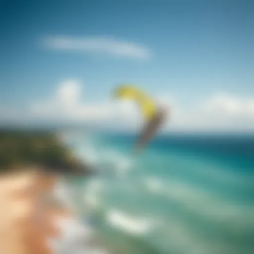 Cabrinha kite soaring in the sky above a vibrant beach