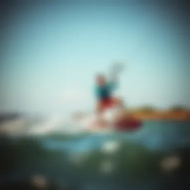 Action shot of kiteboarder using Dakine equipment on the water