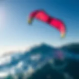 A vibrant kite soaring above the ocean waves