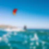 Kite Surfing Adventure in Southern California A breathtaking view of a kite surfer riding the waves off Southern California's coast