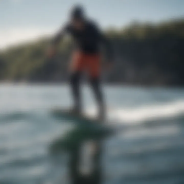 A sleek non-electric hydrofoil board gliding over the water's surface