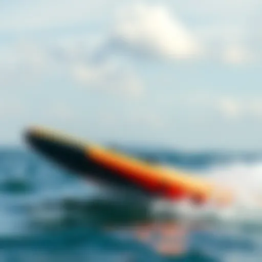 Inflatable Wing Board in Action An inflatable wing board gliding over water