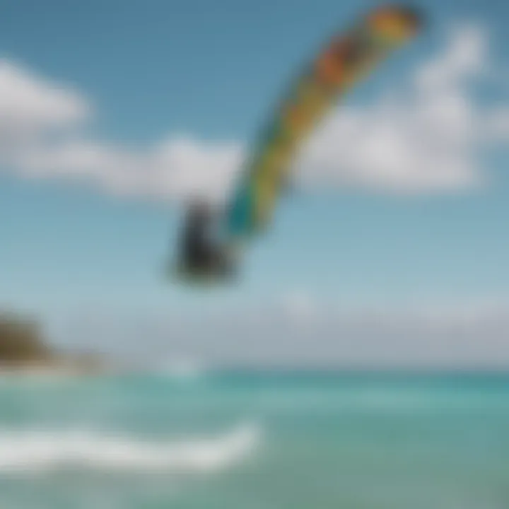 Kiteboarder gracefully gliding over the turquoise waters