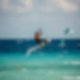 Kiteboarder soaring above turquoise waters