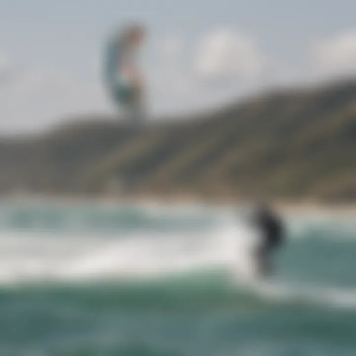 A kiteboarder skillfully maneuvering with a small kite against scenic ocean backdrop.