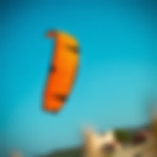 A vibrant large kite soaring against a clear blue sky