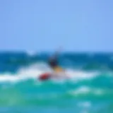 Kite surfing action shot on ocean waves