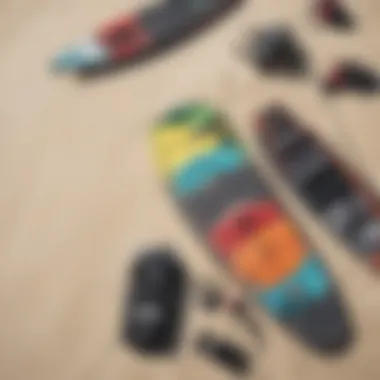 Colorful kiteboarding equipment laid out on the beach