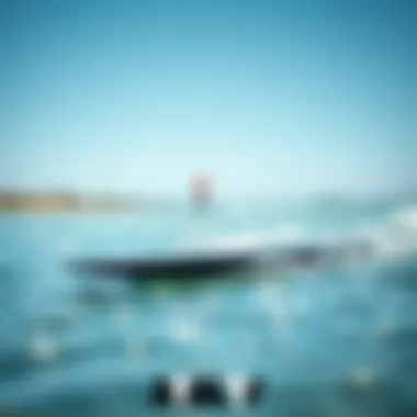 Sleek Design of a High-Performance Foil Board High-performance foil board on water showcasing its sleek design