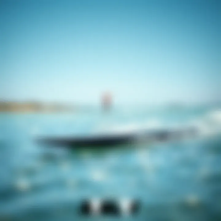 Sleek Design of a High-Performance Foil Board High-performance foil board on water showcasing its sleek design