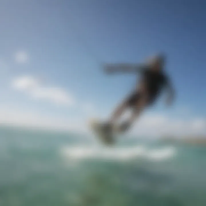 A kiteboarder gliding over crystal-clear waters of Molasses Reef.