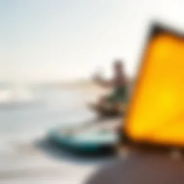 User testing the Skywalker kiteboard on a sunny beach