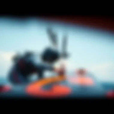 Kiteboarder performing maintenance on the Slingshot Wing Board