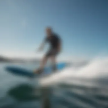 Effortless Gliding on Hydrofoil A person gliding effortlessly above the water on a stand up hydrofoil.