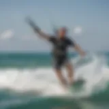 Kiteboarder performing the slingshot maneuver on the water