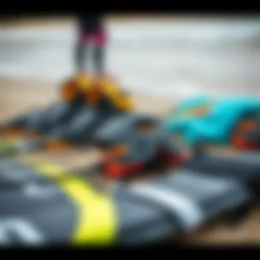 Close-up of specialized kiteboarding gear laid out on the beach