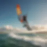 A breathtaking view of a kiteboarder gliding over the water with a wing sup board.