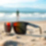 Kite surfing glasses on a sandy beach
