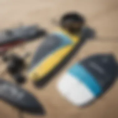 Close-up of essential kite surfing gear laid out on the beach