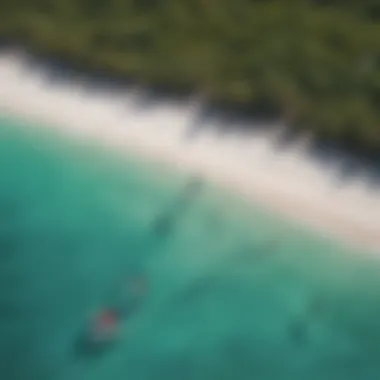 Aerial view of kite surfers navigating the turquoise waters