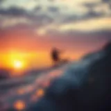 Kiteboarding at Sunset Kiteboarder gliding through the waves at sunset