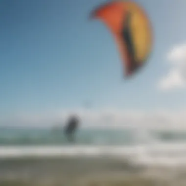 An individual practicing with a trainer kite on the beach