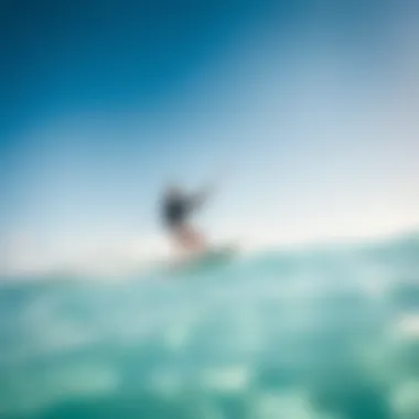 Riding the Waves in Paradise A kiteboarder riding the waves under a clear blue sky