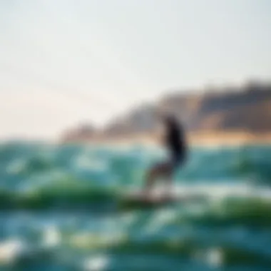 Kiteboarder riding the waves under optimal wind conditions