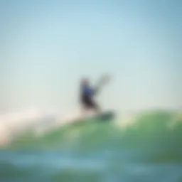 Kiteboarder navigating the waves at Panama City Beach under clear skies