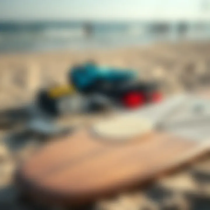 Essential kite surfing gear laid out on the beach