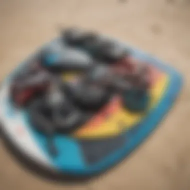 Close-up of kiteboarding gear laid out on the beach