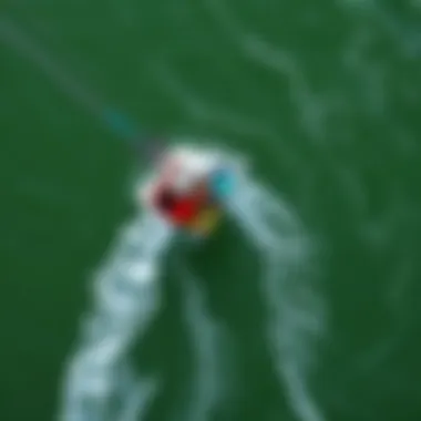 Aerial View of Flip Tip Performance Aerial view of kiteboarder performing a flip tip on water
