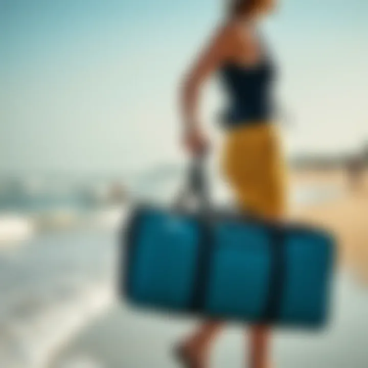 A rider effortlessly carrying the Mystic kite bag on the beach