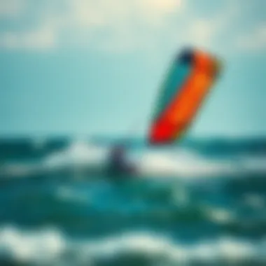 Vibrant Naish kite soaring above the waves