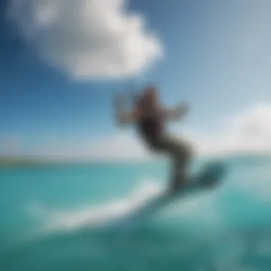 Kiteboarder soaring over turquoise waters