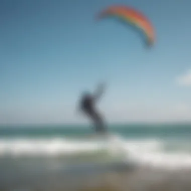 Beginner kiteboarder flying the Ozone Ignition kite on a beach demonstrating ease of use.