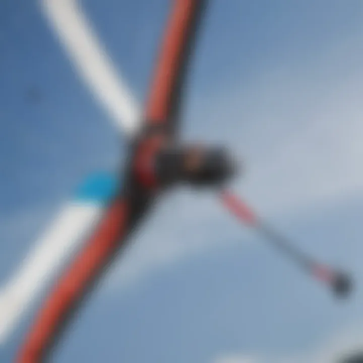 Close-up of the Ozone Ignition trainer kite's control bar and lines highlighting safety features.