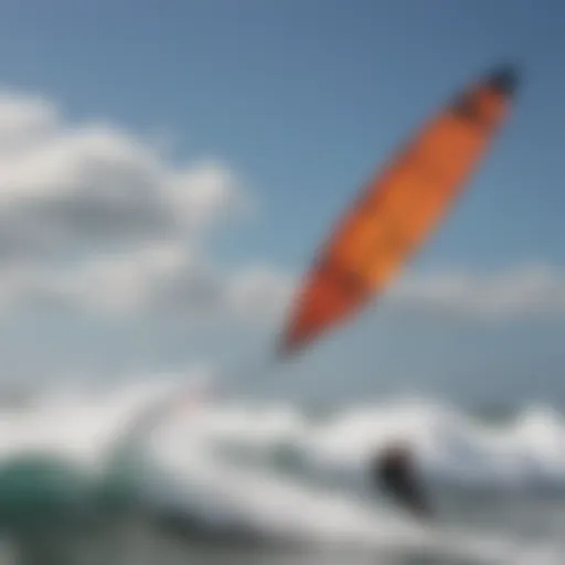 Dynamic Switchblade kite soaring above the waves