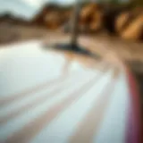 A close-up view of a wind surfboard showcasing its unique design elements.