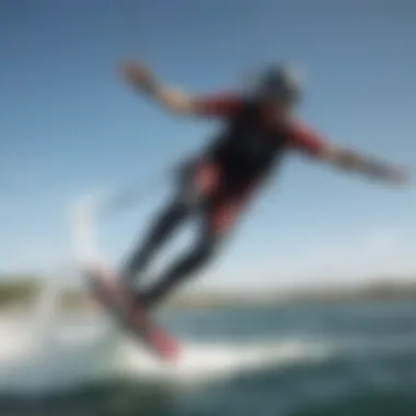 Aerial Mastery: The Art of Kiteboard Jumps Kiteboarder performing an impressive jump over the water